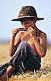 farm boy playing harmonica